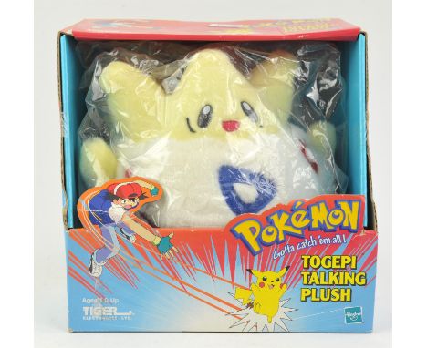 Pokémon Talking Togepi Plush Toy Condition Report:  The item is complete, boxed and unopened. There is a noticeable dent in t