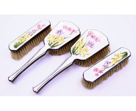 A silver and floral enamel dressing table set&nbsp;