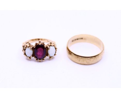 A 9ct three stone garnet and opal ring together with a 9ct wedding band (2), weight: 7.3g