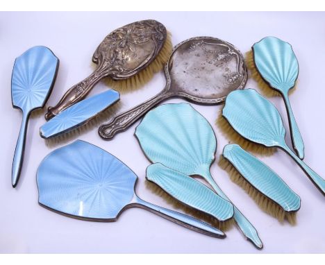 Eight various silver guilloche enamelled dressing table brushes and mirror together with a further silver backed mirror and b