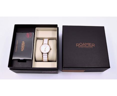 A Roamer lady's sapphire watch with white enamel dial and bracelet