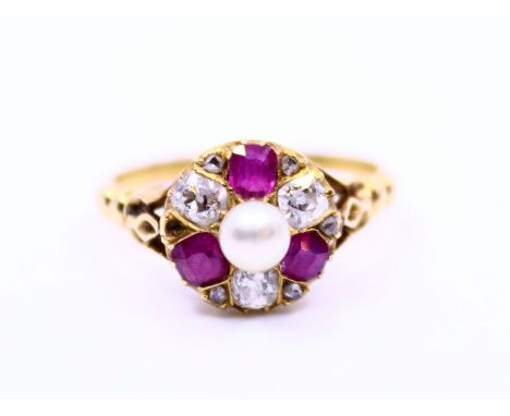 A pearl, diamond and ruby dress ring having central cultured pearl and three cushion-cut diamonds set alternately with three 
