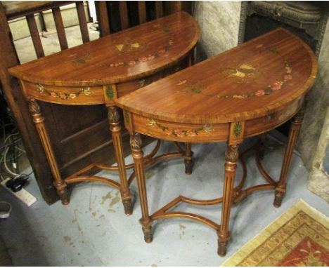 DEMI LUNE CONSOLE TABLES, a pair, Sheraton style satinwood and painted with floral garlands and musical motifs on tapering fl