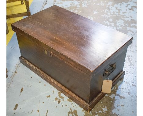 TRUNK, early 20th century stained hardwood with a rectangular rising top enclosing space for storage and carrying handles, 83
