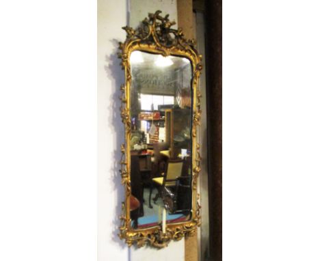 PIER GLASS, 19th century of compact proportions with scrolled floral gilt frame, 36cm W x 62cm H.