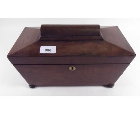 A Victorian mahogany sarcophagus form tea caddy fitted within two caddy boxes 