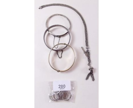 A gold plated bangle, a silver bracelet, white metal fob bracelet, rings etc.