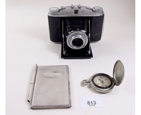 An Afga Solette camera, a compass and a cigarette case 