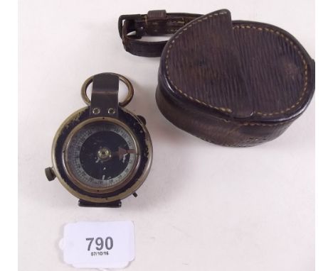 An old military compass in leather case  