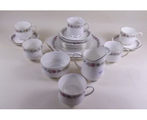 A Royal Albert tea service 'Belinda' comprising: six cups and saucers, cake plate, six tea plates, sugar bowl and milk jug 