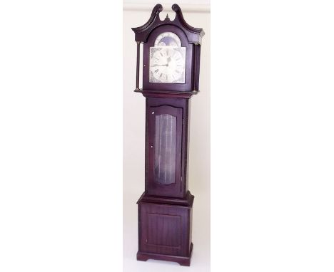 A reproduction mahogany longcase clock with striking movement