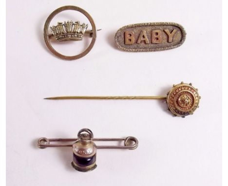 A 15ct gold crown brooch, a yellow metal stick pin, a yellow metal baby brooch and a shipping lantern brooch 