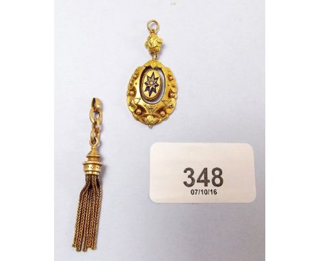 A Victorian yellow metal and enamel pendant and a yellow metal tassel