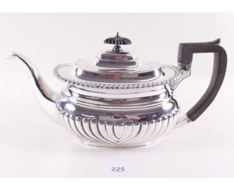 A silver half gadrooned teapot, London 1903, 25 ozs