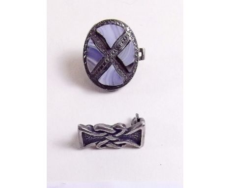 A Victorian agate set bachelor button and a miniature silver Celtic brooch 