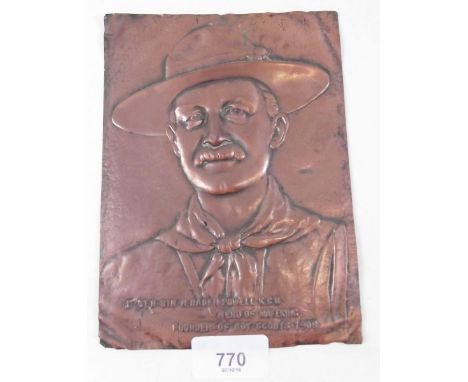 A brass plaque embossed with Lord Baden Powell relating to the Relief of Mafeking - 18 x 13cm