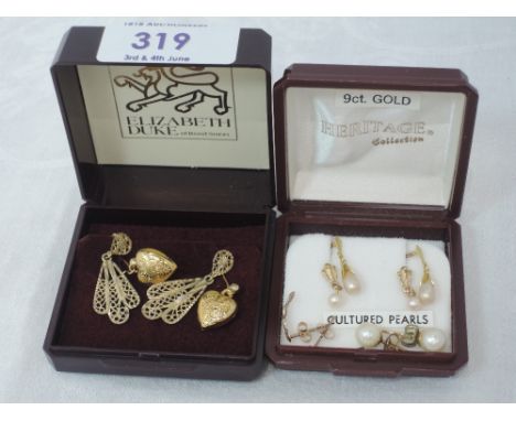 Six pairs of 9ct gold and yellow metal stud earrings including cultured pearl, moulded hearts etc