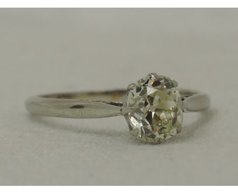 A lady's dress ring having an oval old cut diamond solitaire, approx 0.75ct in a claw set mount to knife blade shoulders on a