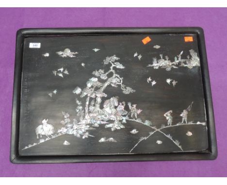 A late 19th century hardwood tea tray having mother of pearl pictorial inlay decoration