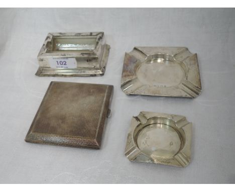 A silver cigarette case having engine turned decoration, Birmingham 1930, Turner &amp; Simpson, two HM silver ashtrays of tra