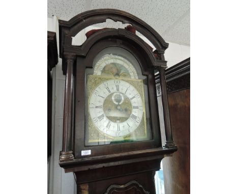 A late 18th century mahogany longcase clock having double arch and pillar top containing brass and silvered face, with 8 day 