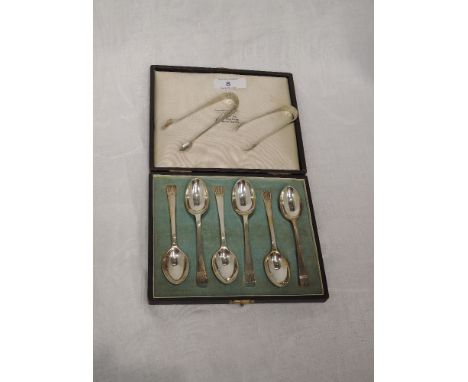 A cased set of six silver silver tea spoons having engraved architectural decoration to terminals, London 1948, Wakely &amp; 