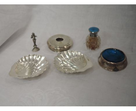 A small selection of silver including a pair of Victorian scallop shell butter dishes, Sheffield 1899, James Deakin &amp; Son