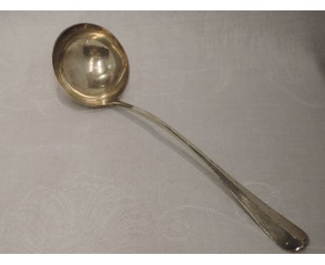 A large silver ladle of rat tail design bearing crest to reverse of terminal, London 1912, Francis Higgins &amp; Son Ltd,  ap