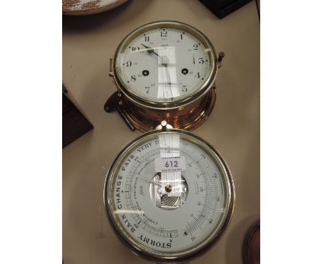 A pair of late 20th century ships design circular brass wall mounted barometer and clock by Schatz marked Royal Mariner