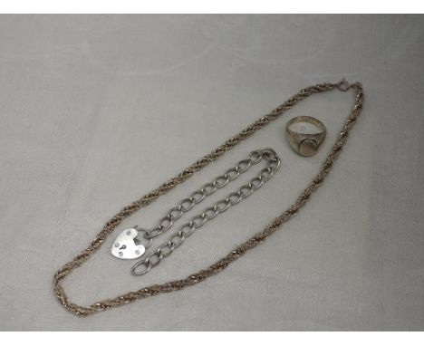 A silver rope chain necklace, approx 16', a silver curb chain bracelet and a silver signet ring