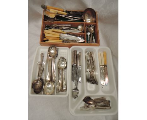 A selection of plated loose flatware including basting spoon, ladle, fish knives and forks, soup spoons etc