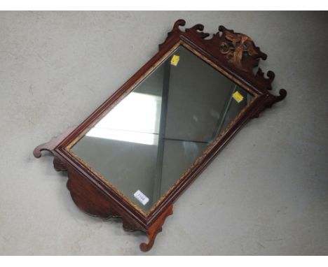 A 20th century mahogany wall mirror in the Chippendale period style