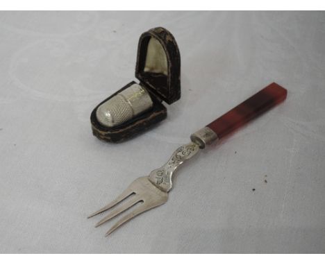 A cased Victorian silver thimble of traditional form, Chester 1896, Henry Griffith &amp; Sons Ltd, and a white metal pickle f