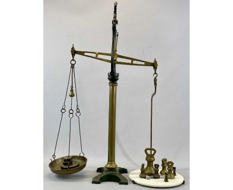 VICTORIAN BRASS & CAST IRON BEAM SCALES, one side with pear shaped weight over brass pan opposite with detachable ceramic pla