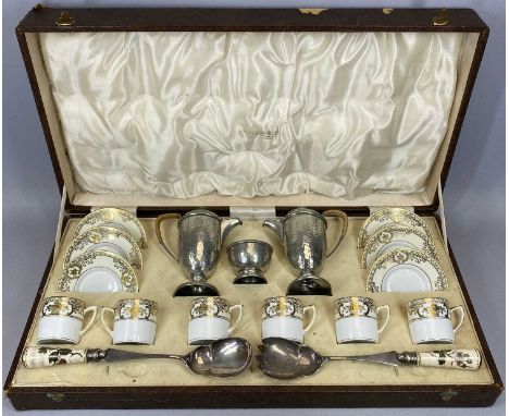 ALEXANDER CLARKE CO LTD CASED COFFEE SET: 6 Noritake cups and saucers, cream and white glazed with heavily gilded border, ham