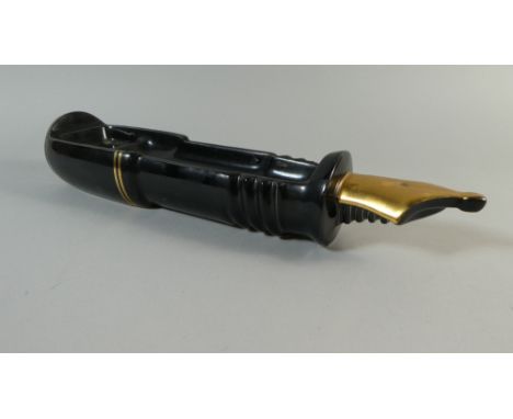 A Vintage Advertising Ceramic Desk Tidy, Modelled as a Parker Pen in Black and Gold Colour ways. By 'The Silver Crane Company
