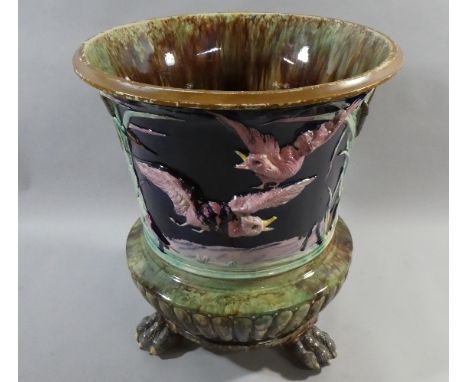 A Large Majolica Planter Decorated in Relief with Sporting Dogs Driving Birds out of Bullrushes. Three Claw Feet. 53cms Diame