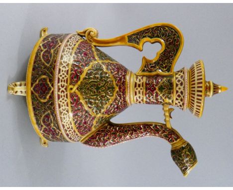A Hungarian Ceramic Water Jug by Zsolnay Pecs. Multicoloured Enamel Work and Geometric Designs Over and with Gilt Highlights.