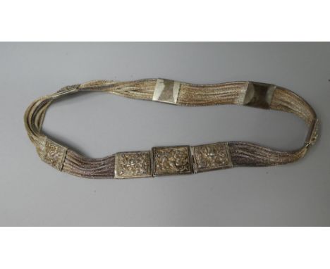 A Malayan White Metal (Stamped) Vintage Belt. Silver Metal Rope Strands with Square Repousse Worked Panels at Varying Section