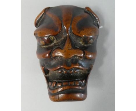 A Nicely Patinated 19th Century Japanese Carved Wood Netsuke of a Noh Mask.