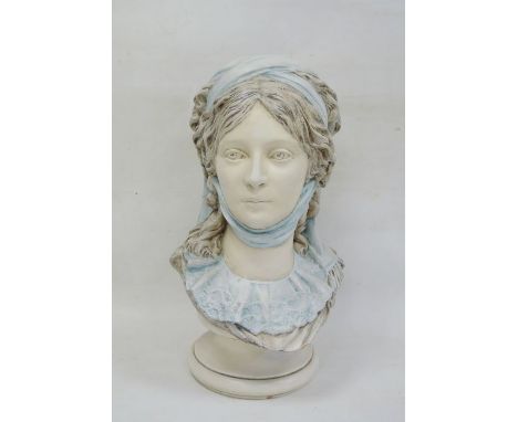 Ceramic bust of a woman, blue scarf headdress, on circular socle, 48cm high