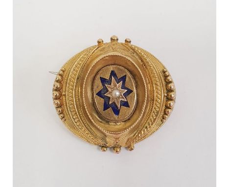 Victorian gold-coloured, pearl and blue enamel brooch, oval and centred by cultured pearl in star-shaped and blue enamel sett