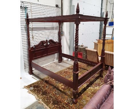 Modern mahogany four-poster bed with turned and carved posts and heavily carved headboard (with slats for the base and the po