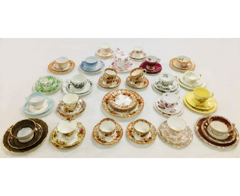 A collection of decorative ceramics, comprising eighteen trios, including Portmeirion The Holly and The Ivy, Royal Albert Old