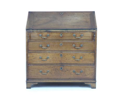 A 19th century mahogany bureau, with hinged fall front to reveal fitted interior, above four graduated drawers, raised on bra