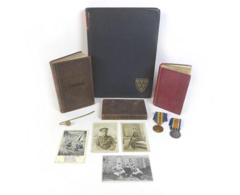 A collection of books, postcards and militaria, including a WWI Victory medal and a Defence medal with ribbons for '200512 PT