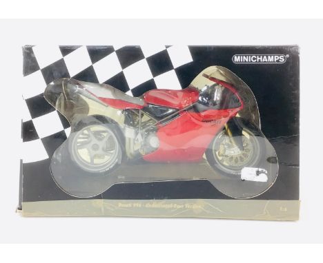 A Minichamps die-cast 1:6 scale model Ducati 998R in red, with a window box for Ducati 996. 