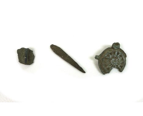 A group of three interesting and decorative Bronze Age, Roman and Early Medieval detectorist finds, comprising a Bronze Age c