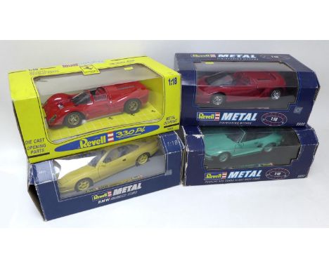 Four Revell die-cast 1:18 scale model sports cars, comprising a Revell Jouefevolution Ferrari 330 P4 in red, and three Revell