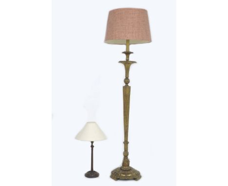 A giltwood and gesso standard lamp of tapering fluted form, raised on a double florette base, 155cm tall, together with a mah